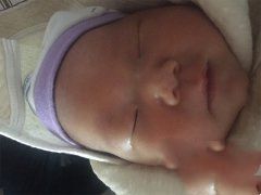 新生儿降临为万女士重新带来笑容